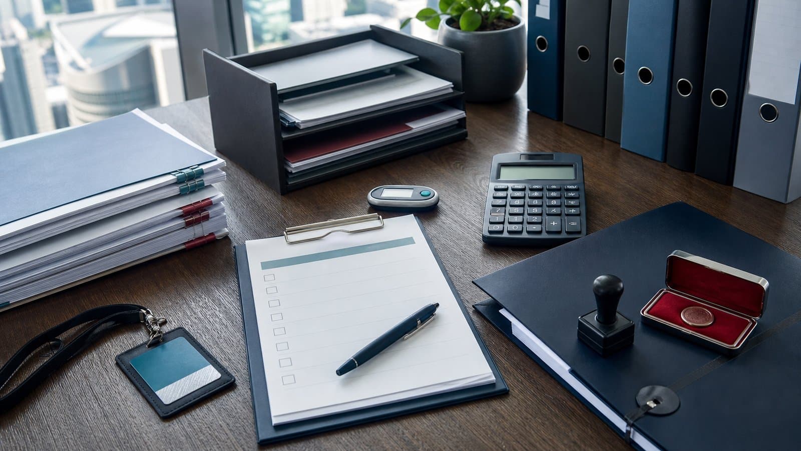 Small WFOE internal-control desk with approval checklist, bank security device, company chop and document files